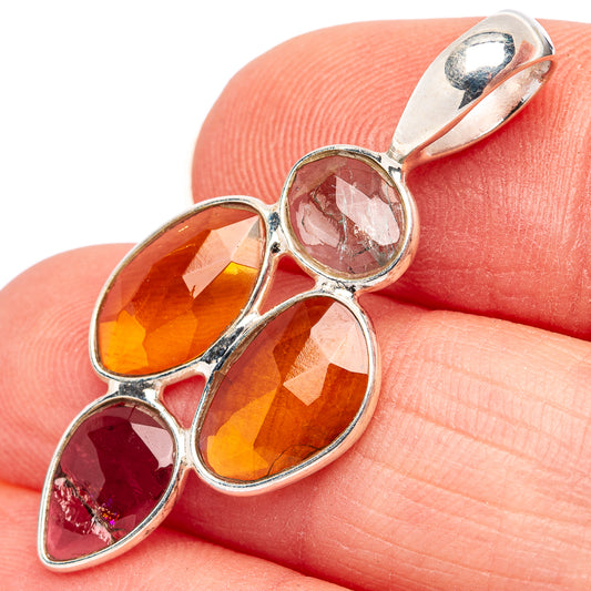 Sterling silver tourmaline pendant with faceted orange and red teardrop stones