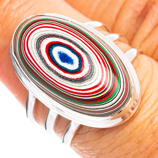 Oval silver ring with colorful concentric inlay center blue red green stripes