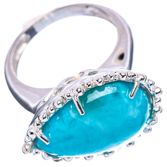 Sterling silver ring with oval turquoise larimar, scalloped halo and split prongs