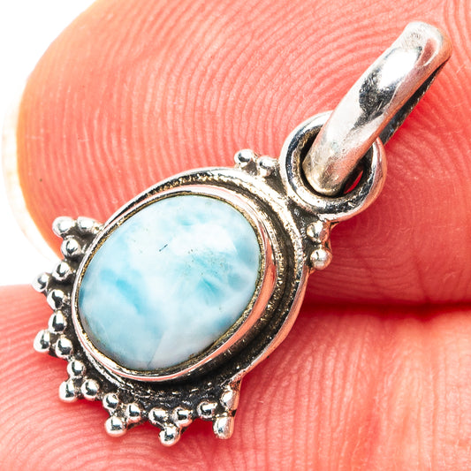 925 sterling silver oval larimar pendant with ornate bezel and small bead detailing