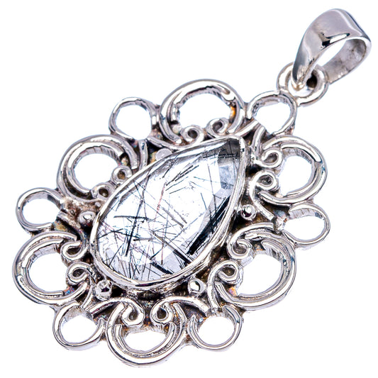 Sterling silver teardrop pendant with faceted tourmalinated quartz cabochon in filigree frame