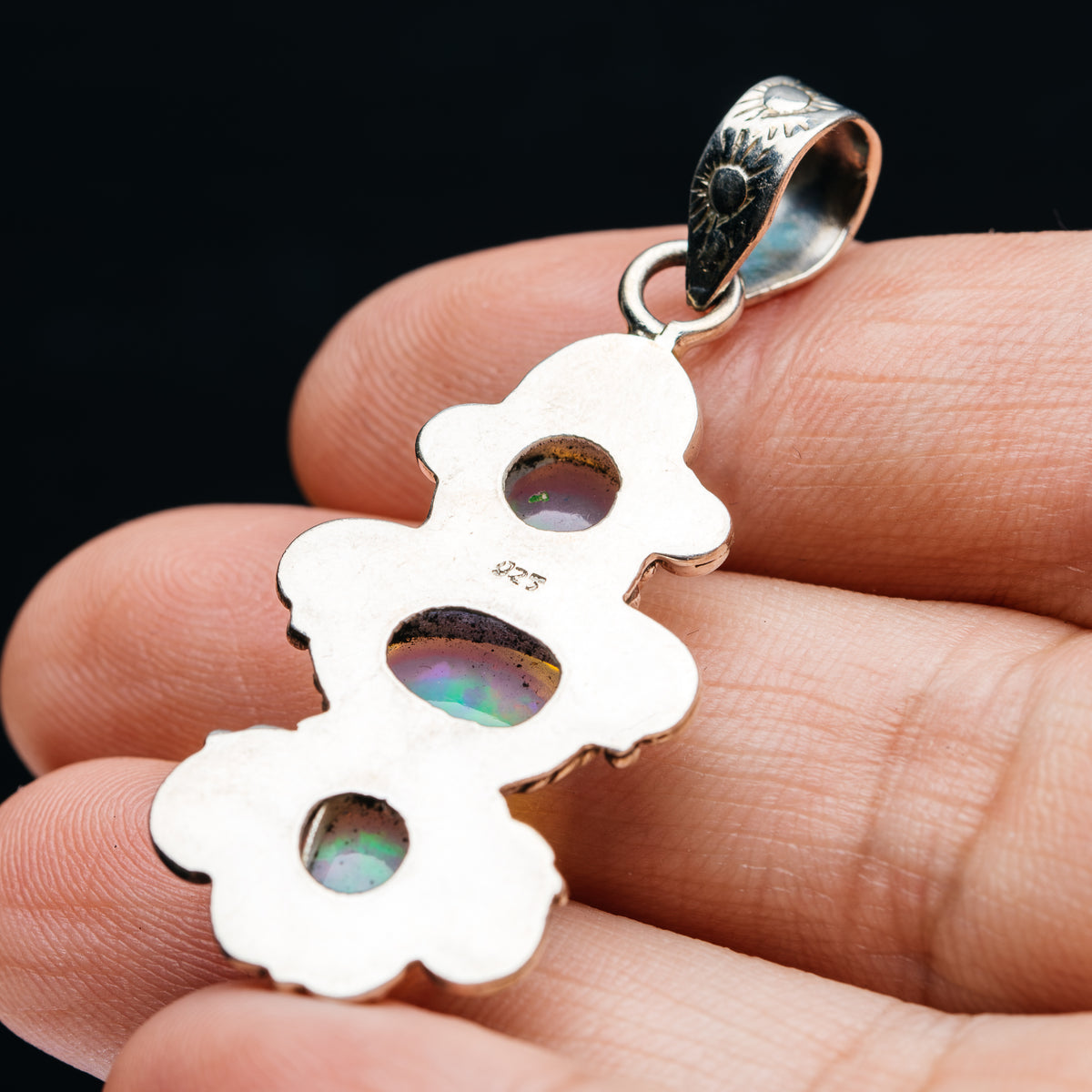 Sterling silver opal pendant back with three inset round stones and bail loop