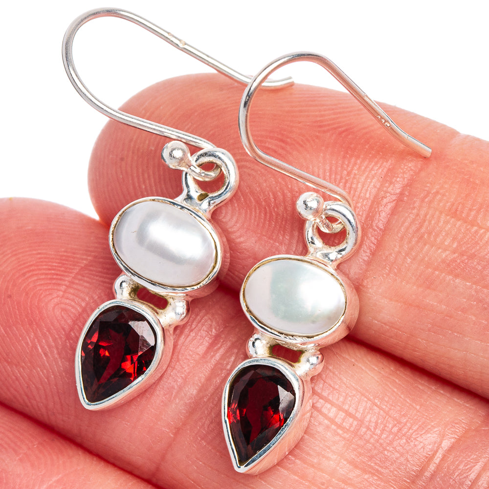 Sterling silver earrings with iridescent cultured pearl and marquise red garnet teardrop