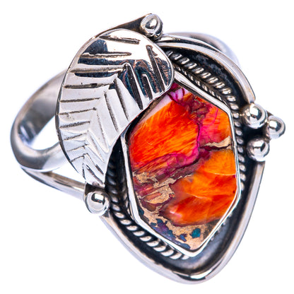 Sterling silver ring with oval multicolor stone and engraved leaf design