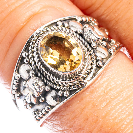 Sterling silver citrine ring with ornate oval gemstone setting, size 9