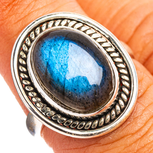 Oval labradorite gemstone ring in .925 sterling silver bezel with blue flash