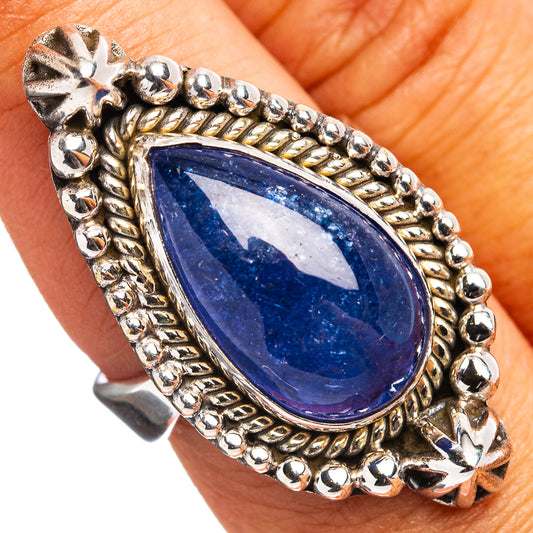 Blue oval tanzanite-style gemstone ring in .925 sterling silver with bead and scrollwork