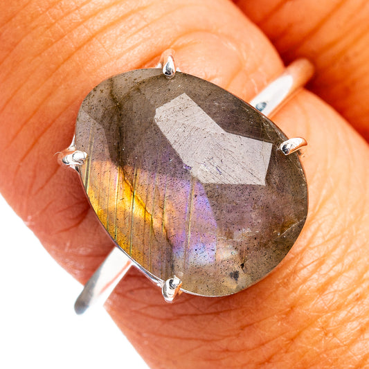 Faceted labradorite ring with oval dark-gray stone, sterling silver prong setting