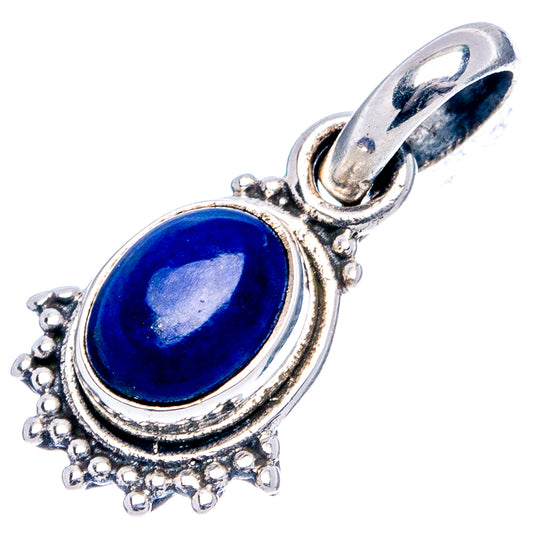 Blue lapis cabochon pendant with ornate .925 sterling silver scalloped edge