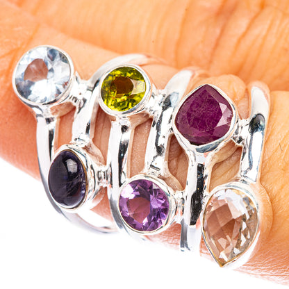 Sterling silver ring with multicolor faceted gemstones: blue, yellow, purple, dark, clear