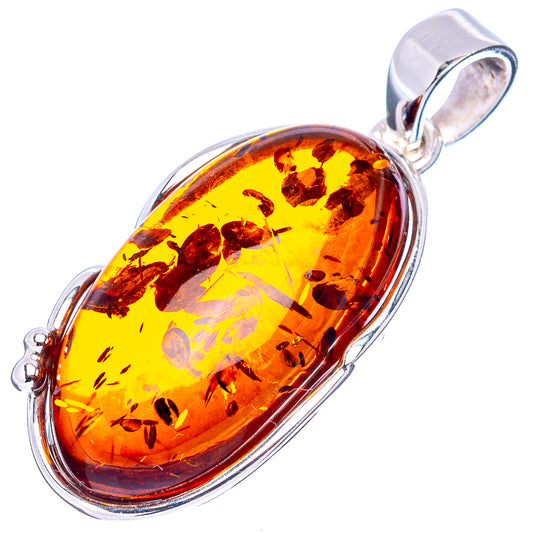 Oval amber pendant in .925 sterling silver setting, yellow-orange stone with inclusions