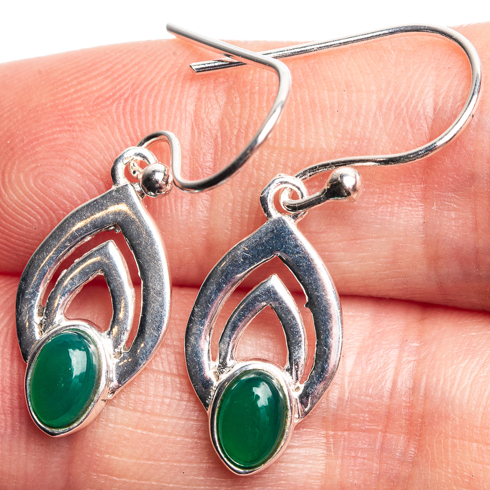 Sterling silver drop earrings with green oval onyx and teardrop swirl frame