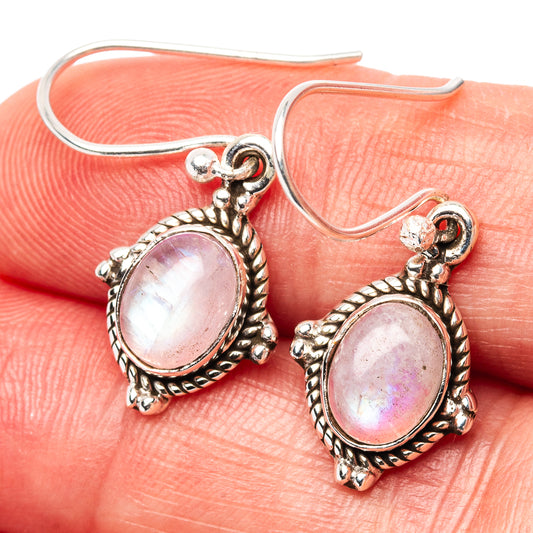 Sterling silver pink moonstone drop earrings with ornate oval bezel and lever backs