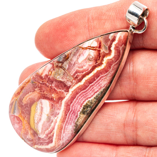 Teardrop rhodochrosite pendant, .925 sterling silver bail; marbled pink and white