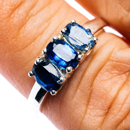 Three-stone kyanite ring with three blue oval stones in .925 sterling silver prongs