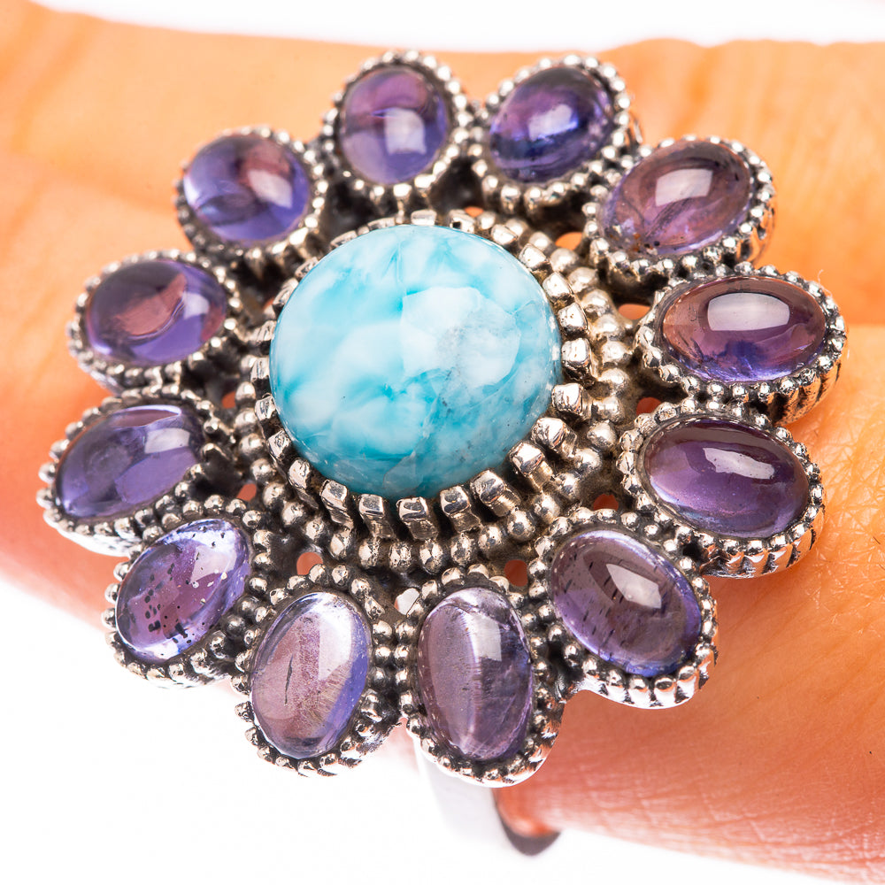 Sterling silver statement ring with round blue Larimar center and purple oval gemstones