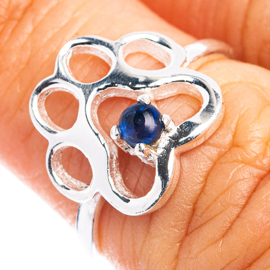 Sterling silver paw ring with blue gemstone and openwork paw-claw detail