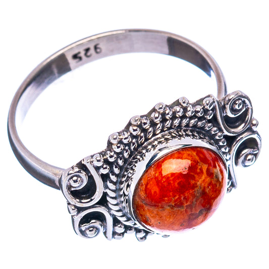 Sterling silver sponge coral ring, orange cabochon with ornate bezel and side scrolls
