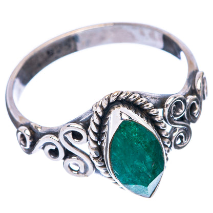 Sterling silver gemstone ring with green oval sillimanite and curled band details