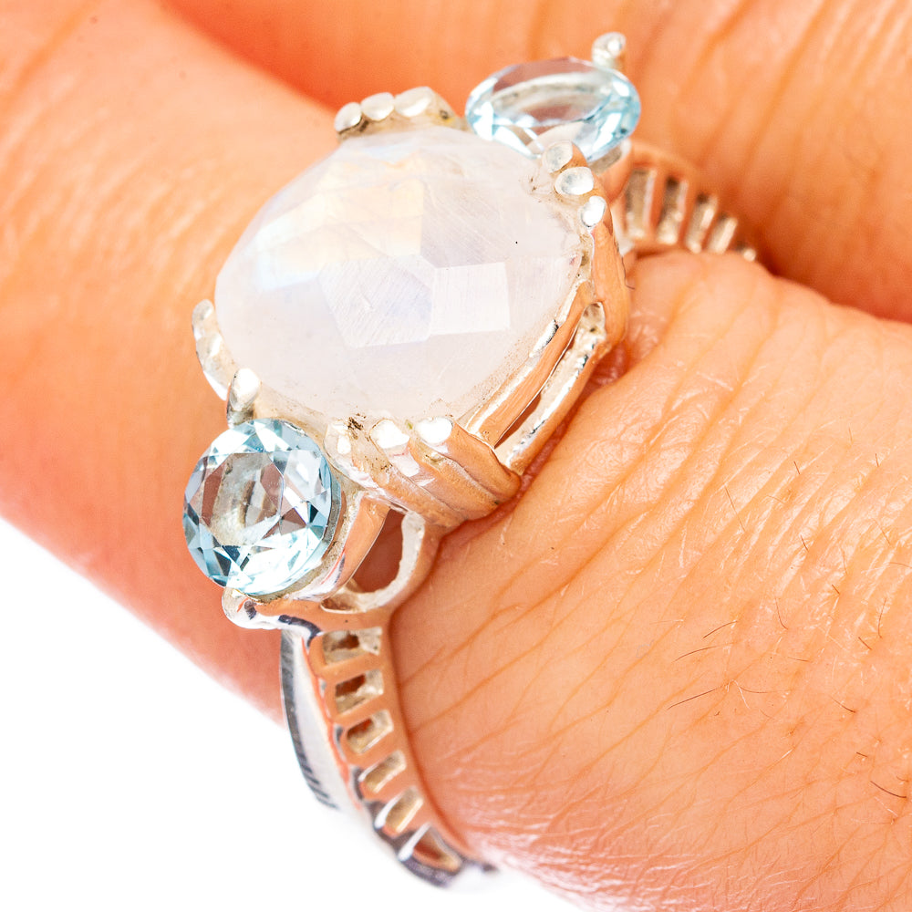925 sterling silver ring with moonstone center and blue topaz side stones