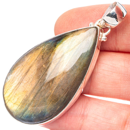 Teardrop labradorite pendant with rainbow sheen in sterling silver bezel and bail