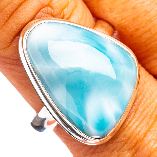Oval larimar gemstone ring in .925 sterling silver with light blue stone, close-up