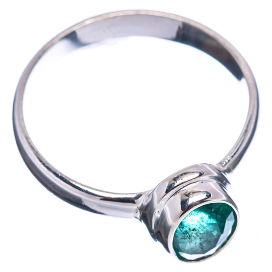 Oval green emerald set in sterling silver band, ring size 7