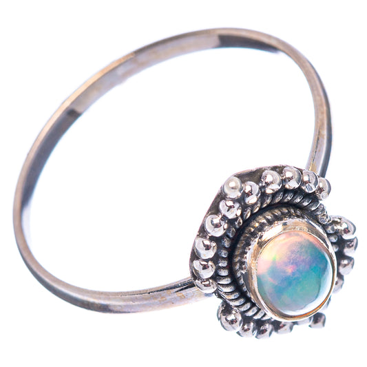 Sterling silver opal ring with oval Ethiopian-style cabochon and beaded halo, size 9.