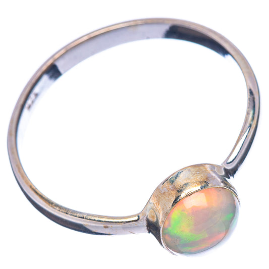 Sterling silver ring with round Ethiopian opal cabochon, side view