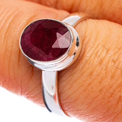 Sterling silver ring, round dark red gemstone, size 8.25
