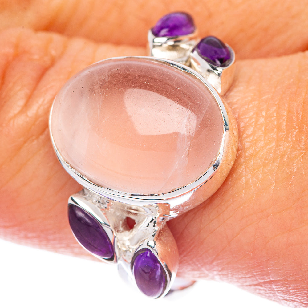 Oval rose quartz 925 sterling silver ring with three purple amethyst accents on the band