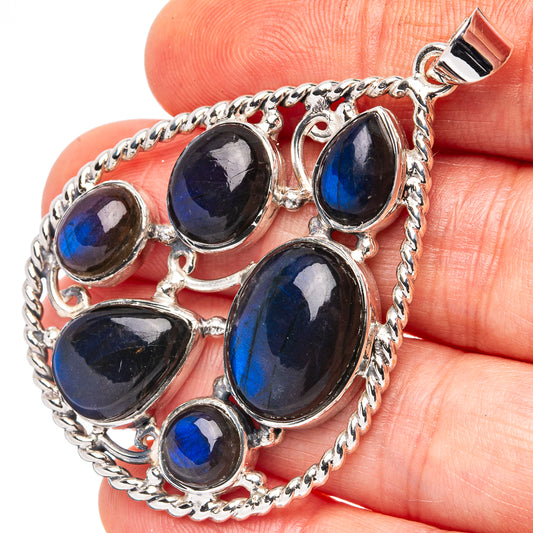 Labradorite pendant in .925 sterling silver with oval blue-gray stones, bail included