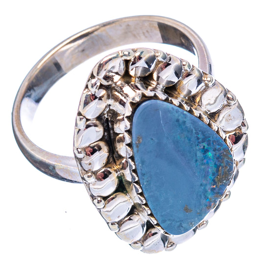 Oval blue opal sterling silver ring with wide beaded prong gallery and openwork band