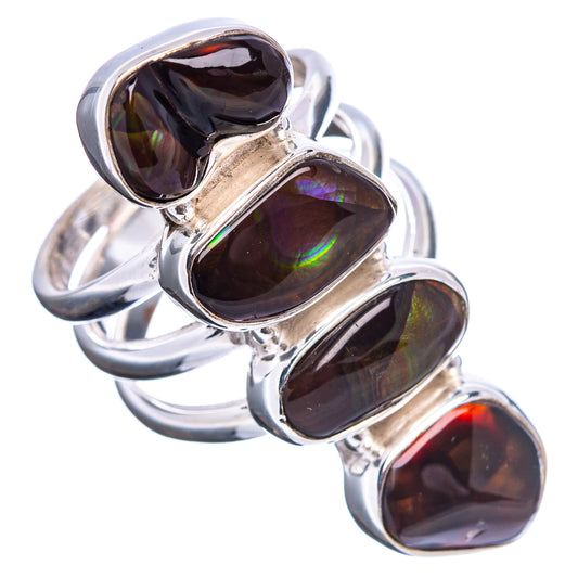 Fire opal statement ring in polished silver, featuring four oval stones with iridescent glow