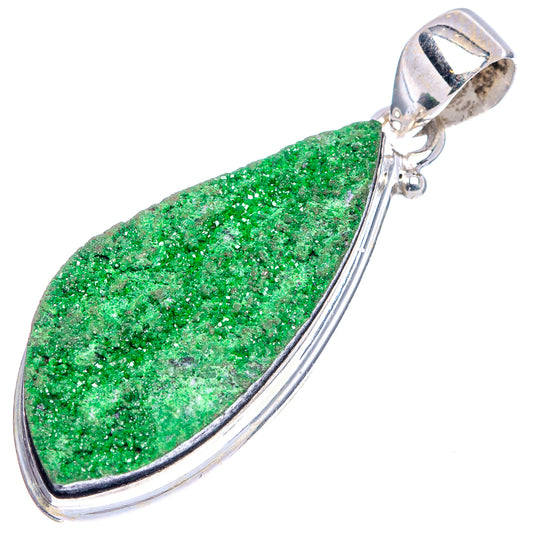 Sterling silver pendant featuring a green teardrop druzy stone in curved bezel
