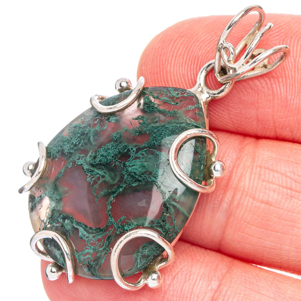 925 sterling silver green moss agate pendant with loop bezel and curved wire settings.