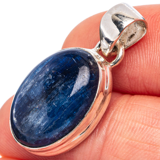Oval kyanite pendant in .925 sterling silver bezel, with hinged bail and open frame