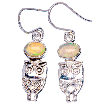 Silver owl earrings with iridescent opal drops, etched owl bodies, fishhook backs