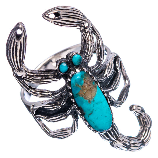 Silver-tone scorpion ring with turquoise oval stone and two small round turquoise accents