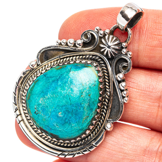 Oval turquoise opal pendant in .925 sterling silver, ornate rope and bead borders