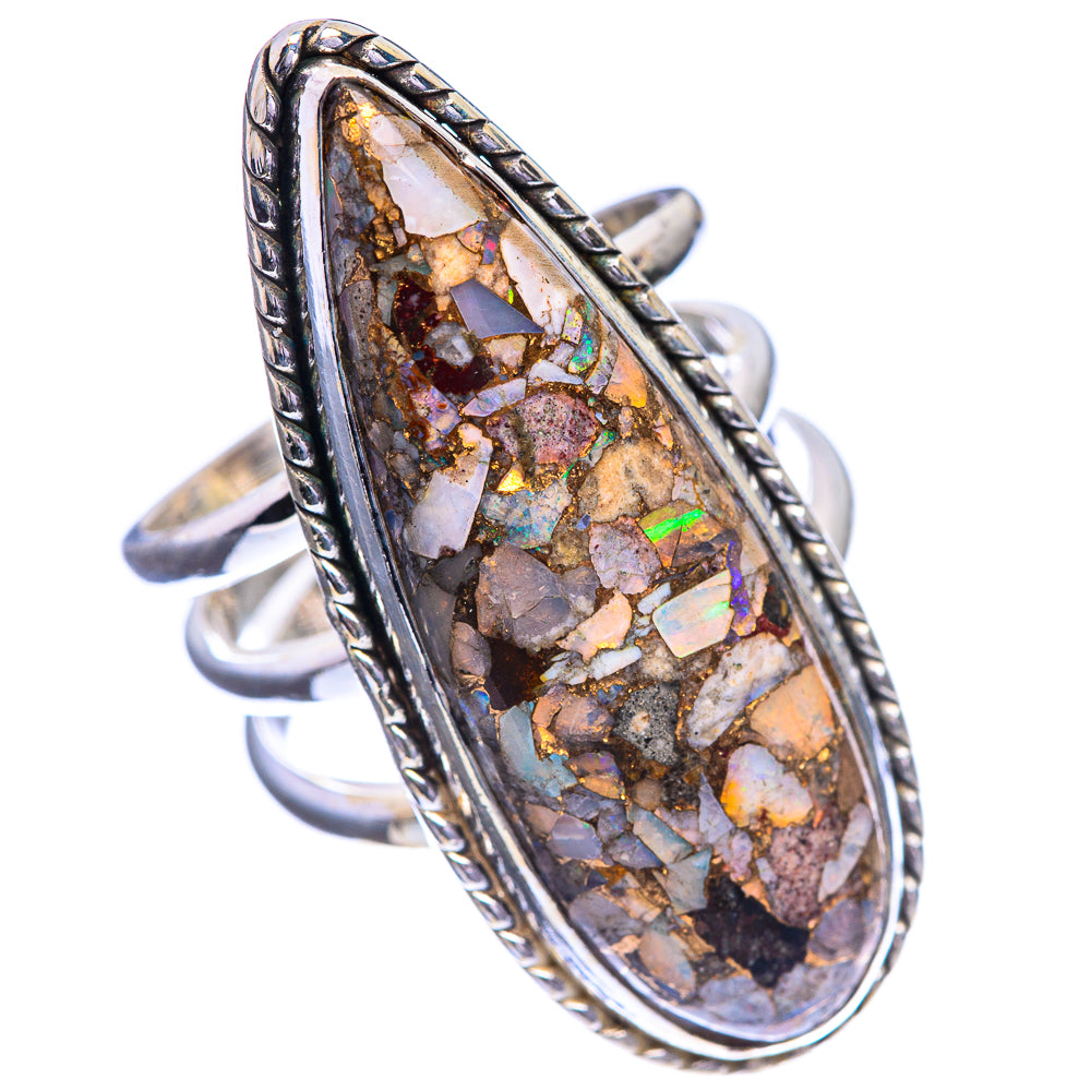 Oval stone in copper composite with rainbow shimmer, bezel-set sterling silver ring