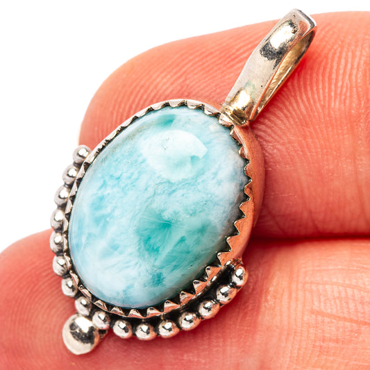 Larimar pendant with oval light-blue gemstone and .925 sterling silver bead setting