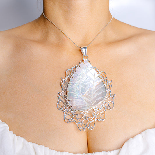 Mother of pearl pendant with ornate .925 sterling silver filigree frame