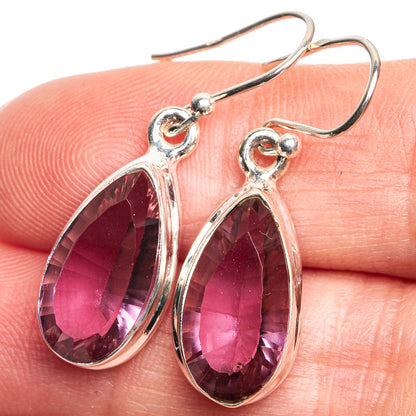 Teardrop color-change earrings in sterling silver with faceted purple stones