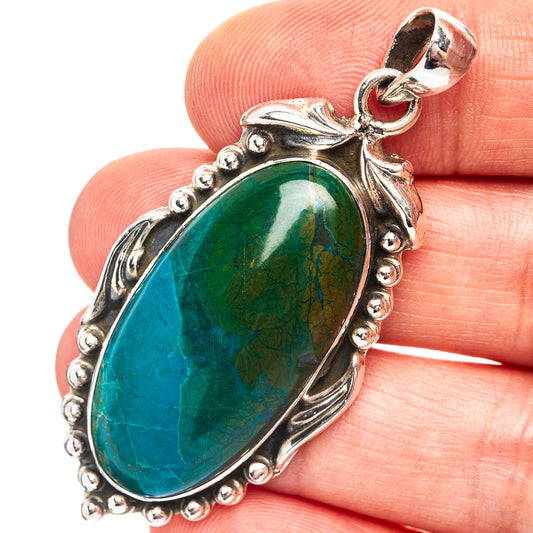 Chrysocolla pendant with oval blue-green cabochon in .925 sterling silver bezel