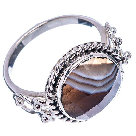 Sterling silver ring with oval dark Botswana agate, twisted rope and petal side details