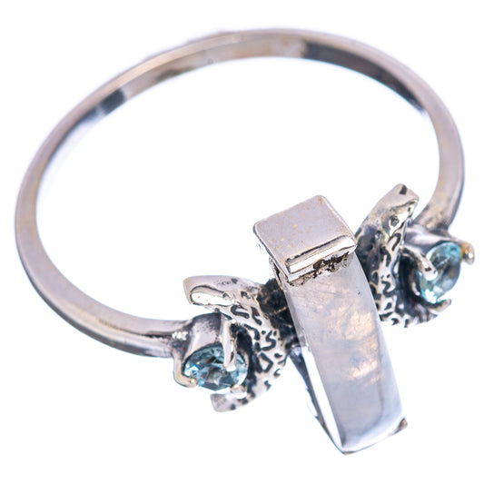 Sterling silver ring featuring moonstone rectangular set and blue topaz side stones