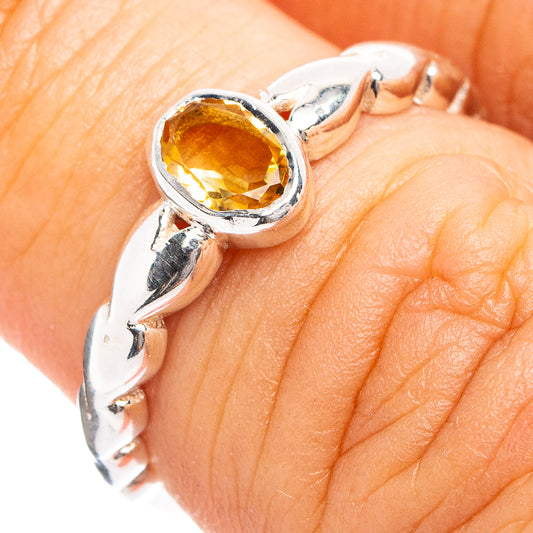 Sterling silver citrine ring with oval amber gemstone bezel setting