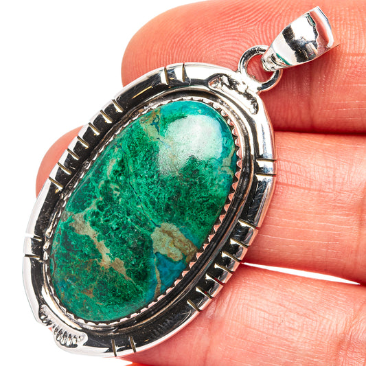 Oval sterling silver pendant with green malachite chrysocolla stone, ornate bezel