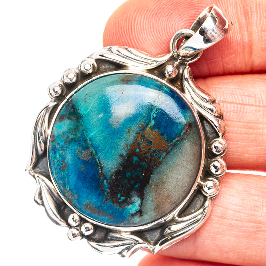 Chrysocolla pendant in .925 sterling silver with round blue-green cabochon stone